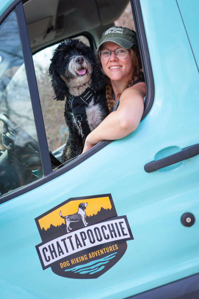 dog in van with hike guide